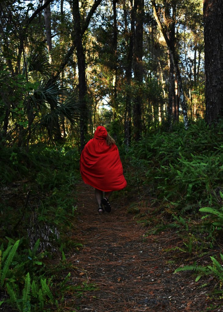 Mom walking alone on a quiet rural road