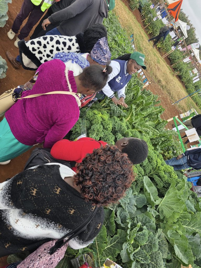 Kenyan farmers and innovators exchanging ideas at Wambugu ATC Exhibition